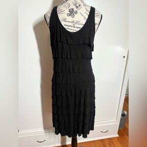 Black “distressed flapper” dress.